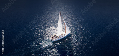Valokuva  Amazing view to Yacht sailing in open sea at windy day