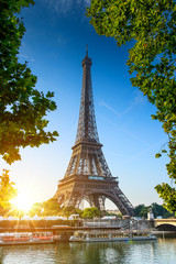 Paris Eiffel Tower at beautiful sunny day. Romantic peaceful atmosphere