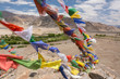 Colorful Buddhist prayer flags in monastery near Leh, Ladakh, India
