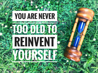 Motivational and inspirational quote - You are never too old to reinvent yourself. With vintage styled background.