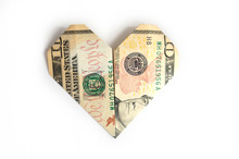 A Ten-dollar Bill Folded In The Shape Of A Heart