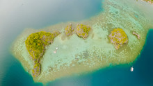 Aerial View Of Small Islands Siete Pecados Near In Coron Bay. Palawan. Overcast