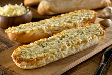 Garlic Bread With Melted Mozzarella Cheese And Herbs