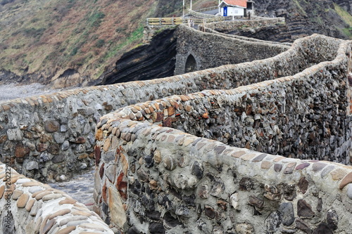 241 stone steps climb to Gaztelugatxe islet top-San Juan hermitage Poster