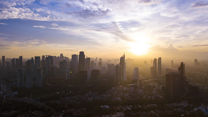 Wall Mural - Beautiful urban skyscrapers under light of sunlight