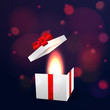 Surprise gift box  with blurred bokeh lights in the background.