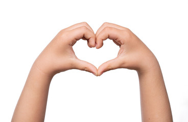 Close up of child hands formig heart shape isolated on white background