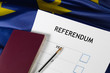 EU Referendum ballot paper, black pen, and passport on the table.