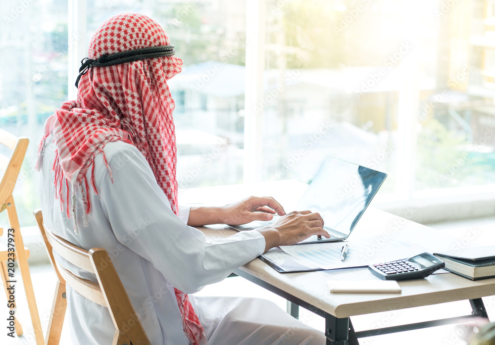 Arabic business people working on laptop in office Stock Photo | Adobe ...