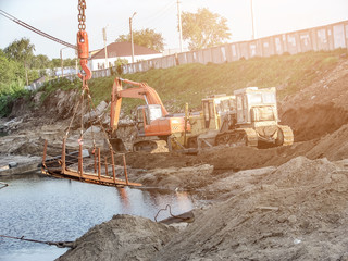 Construction machinery on the construction site summer day