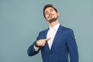 Closeup portrait of proud man pointing finger himself