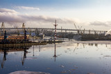 Fototapeta  - Cranes in the marine cargo port of Saint-Petersburg