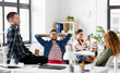 © Syda Productions - business and people concept - happy creative team drinking coffee at office