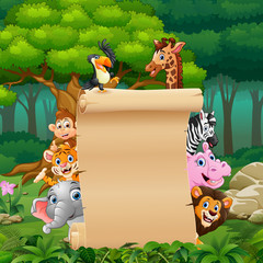 Wall Mural - Animals with paper blank sign at forest