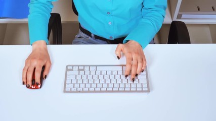 Leinwandbilder - top view unrecognizable woman playing computer game sitting at the white desk workspace