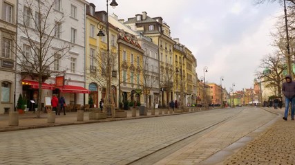 Poster - Warsaw, Poland- December 26, 2017 Tourists walk around the old city.