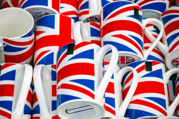 Wall Mural - United Kingdom flag souvenir mugs on display at Camden market in London