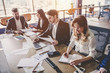 © Vasyl - Group of people working in modern office