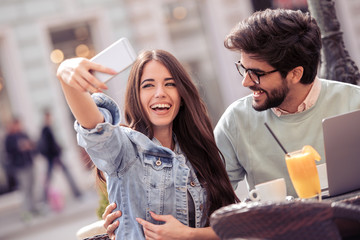 Canvas Print - Couple having great time in cafe together