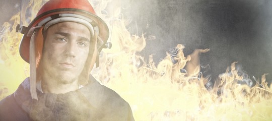Poster - Composite image of serious fireman