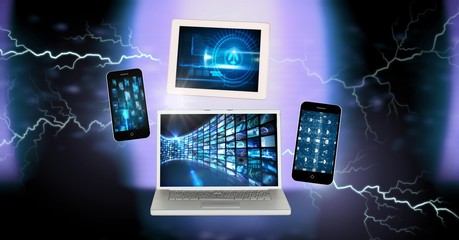 Wall Mural - Lightning strikes and tablet laptop and phones