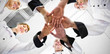 © vectorfusionart - Chefs joining hands in a circle wearing uniforms in a kitchen