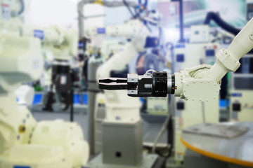 Aufkleber - A robotic arm. Automatic robot in a smart factory. Assembly line