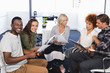 © WavebreakmediaMicro - Portrait of smiling business people with colleagues