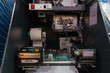 Internal parts of the ATM. The ATM is open for preventive maintenance of the equipment.