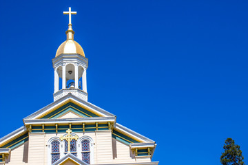 Wall Mural - Old Church Bell Tower With Cross