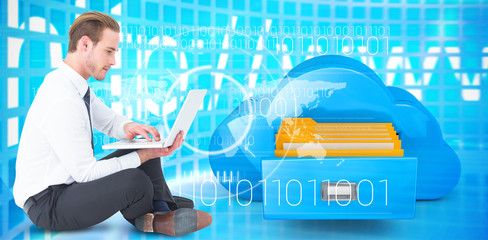 Poster - smiling businessman sitting on floor using laptop against composite image of cloud computing drawer