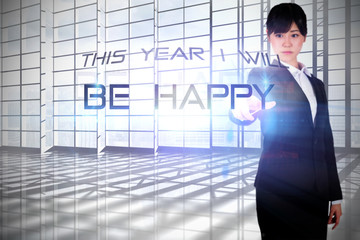 Poster - Focused businesswoman pointing against room with large window overlooking city