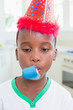 © WavebreakmediaMicro - Happy boy celebrating a birthday