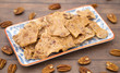 © pamela_d_mcadams - Homemade Pecan Brittle on a Wooden Table