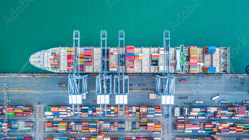 Fotografía Aerial top view container cargo ship, Business import export logistic and transportation of International by containr cargo ship in the open sea