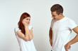 © SHOTPRIME STUDIO - a woman touches her face with her hands and a young man in front of her