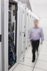 Aufkleber - Man walking towards open server tower