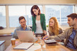 © WavebreakmediaMicro - Group of young colleagues using laptop