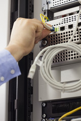 Poster - Man inserting USB wire