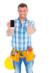 Poster - Happy repairman showing mobile phone white gesturing thumbs up
