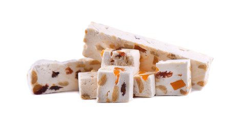 Nut nougat with dried fruit, sweet candy isolated on white background