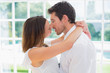 © WavebreakmediaMicro - Loving young couple about to kiss