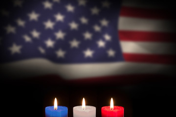 Sticker - Candles on black background against united states of america flag