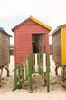 Wooden beach huts on sand
