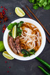 Vietnamese Pho Noodle Soup. Beef with Chilli, Basil, Rice Noodle