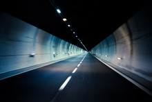 Car Driving Through Tunnel