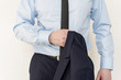 © alexytrener - Closeup Man wearing in suit standing and holdsng jacket in his hand.