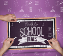 Multiple Hands Writing With Chalk Against Black Chalkboard