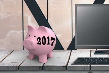 Poster - Digital image of new year 2017 against composite image of a computer over a desk 