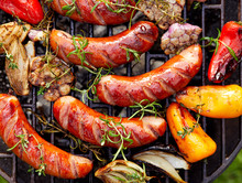 Grilled Sausages And Vegetables On A Grilled Plate, Outdoor, Top View. Grilled Food, Bbq